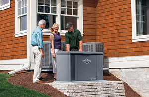 Couple talking to service tech next to a generator