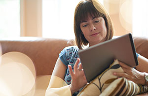 Woman looking at tablet