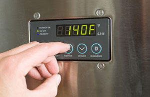 Hand adjusting hot water heater