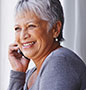 Woman talking on phone smiling