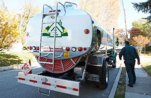 Service tech in front of Region oil truck